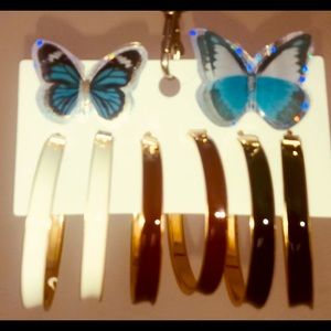 3 pair small to medium hoop earrings, 3 colors.